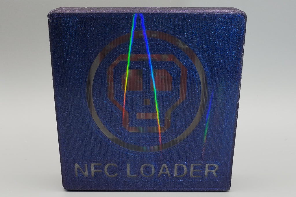 0ldSkull NFC reader, top view showing holographic effect
