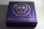 0ldSkull NFC reader, top front view showing color shift and holographic effect