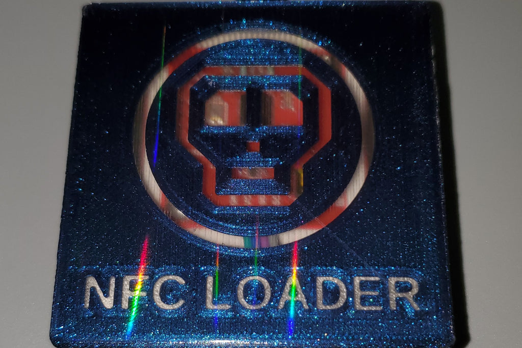 0ldSkull NFC reader, top view showing sparkle and holographic effect