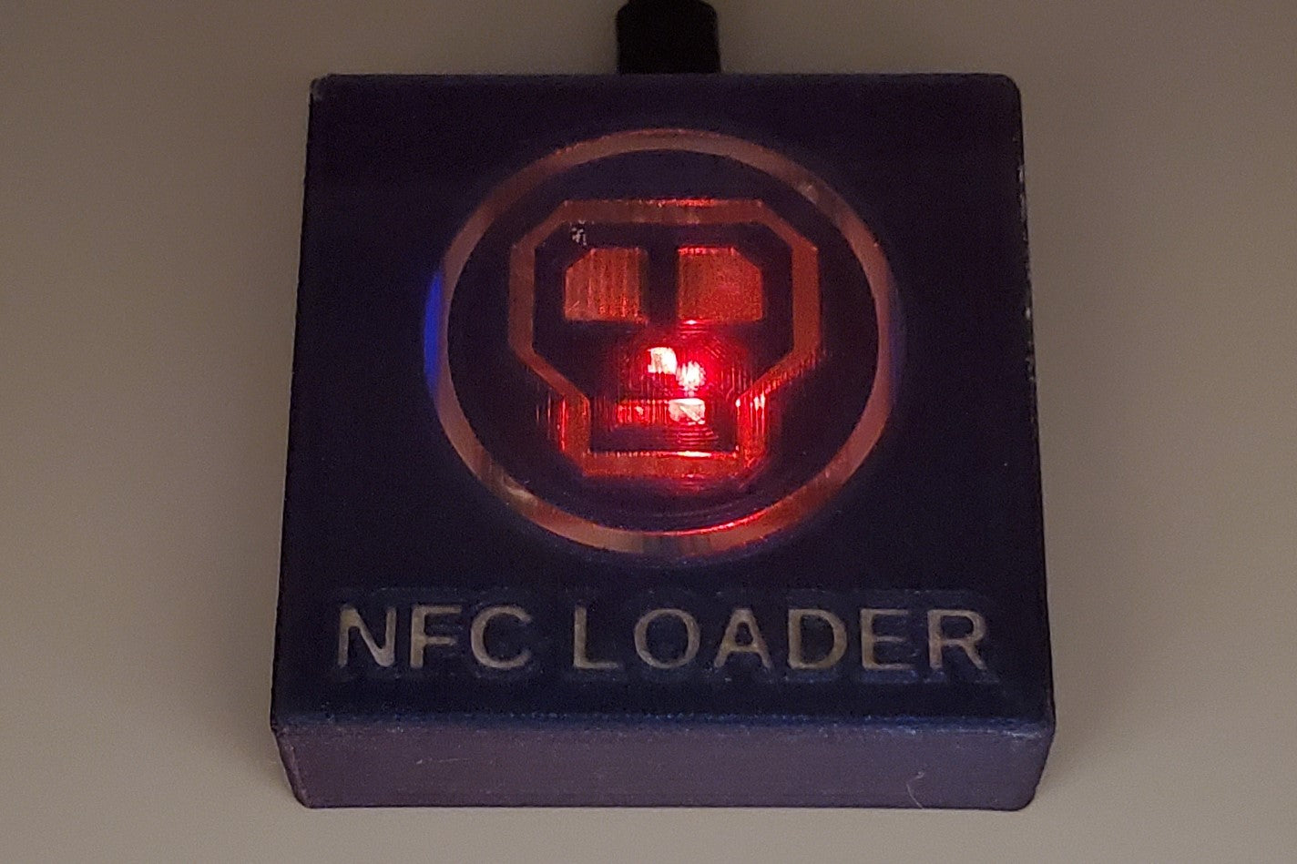 0ldSkull NFC reader, top front view showing power LED