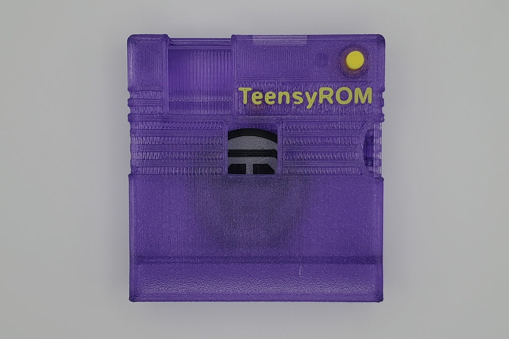 TeensyROM cartridge case in purple, top view showing transparency