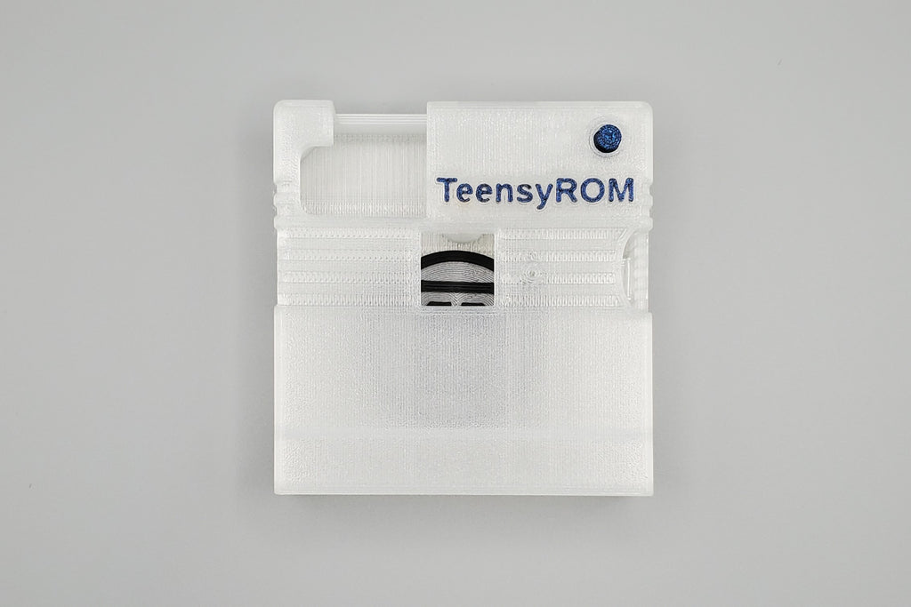 TeensyROM cartridge case in clear, top view showing transparency