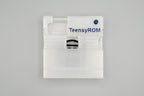 TeensyROM cartridge case in clear, top view showing transparency