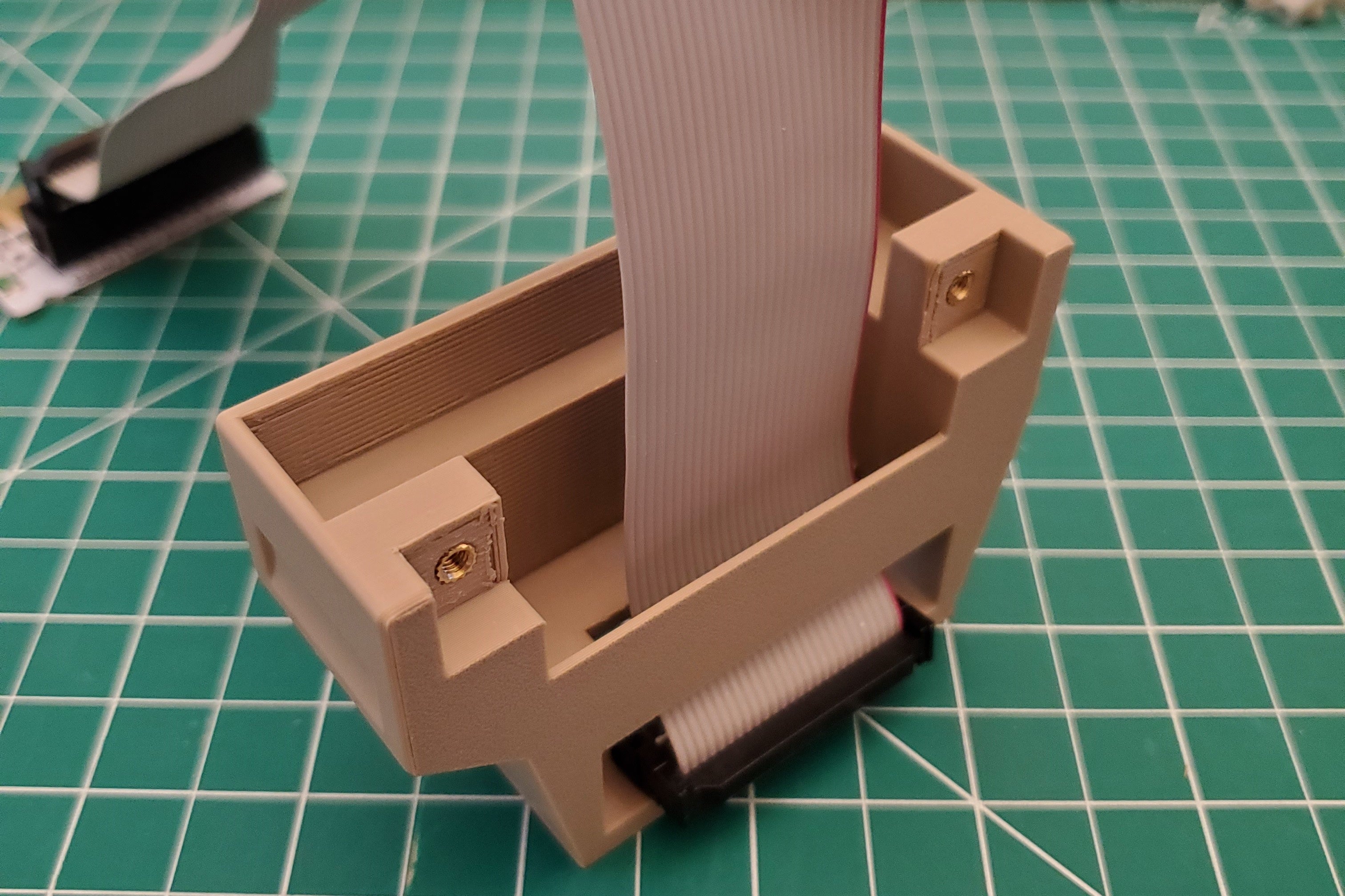 Cable being threaded through vertical user port case