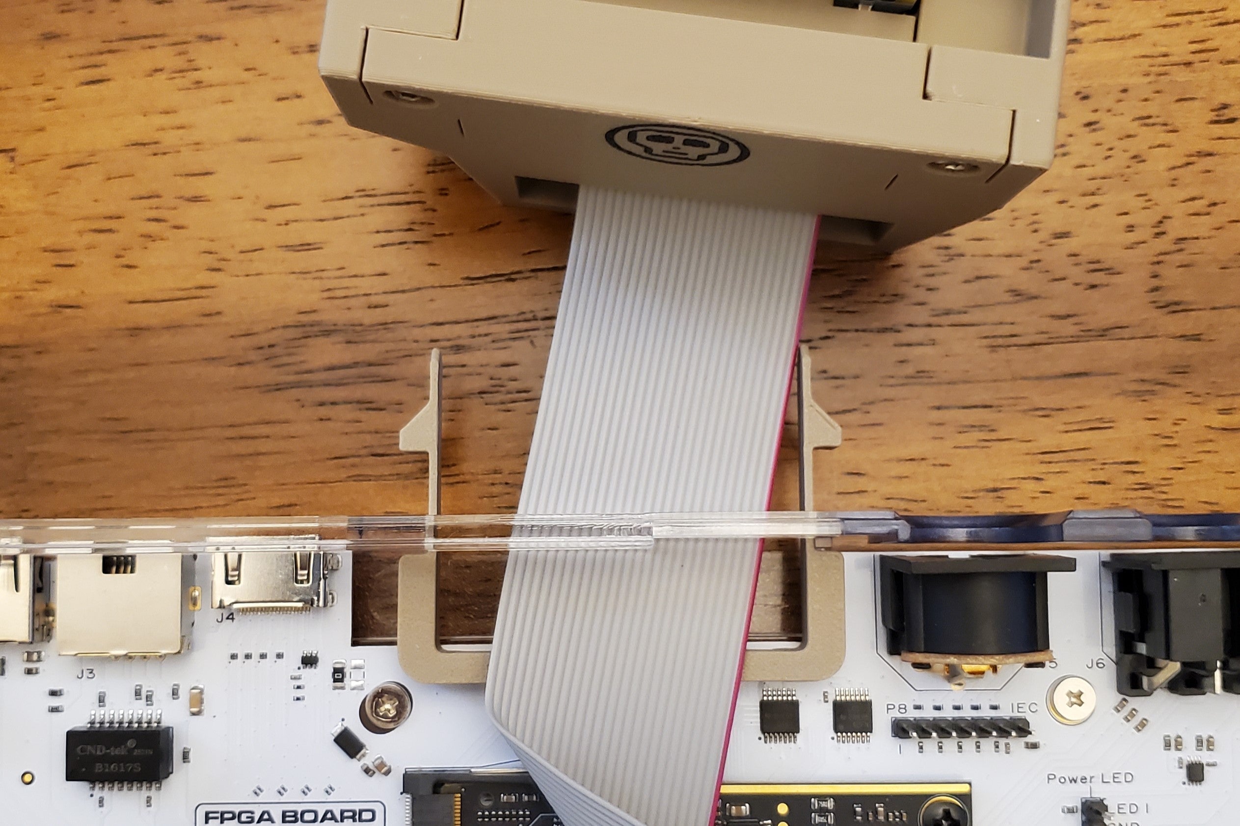 Vertical user port case clip installed in C64U