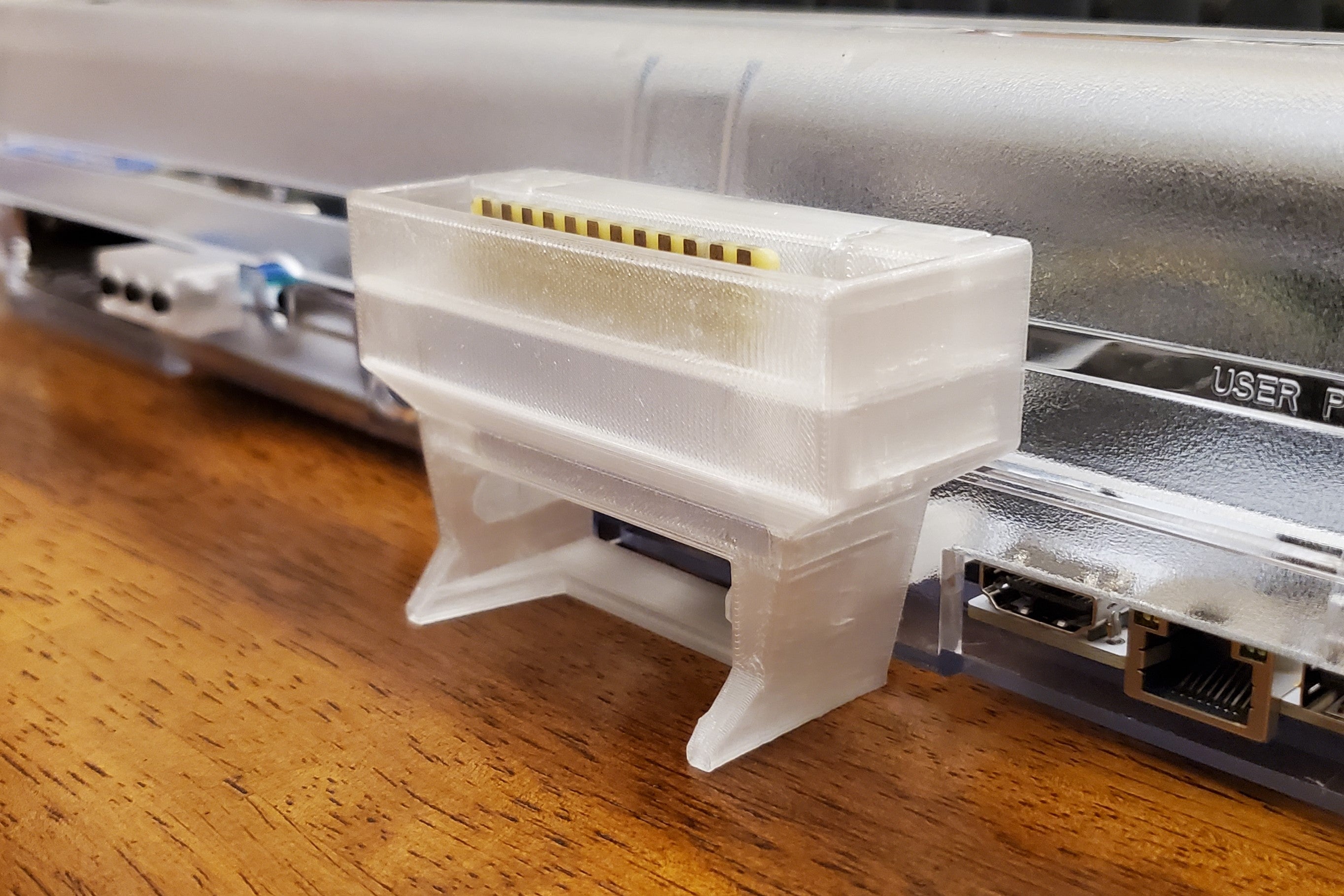 Vertical user port installed, rear oblique view